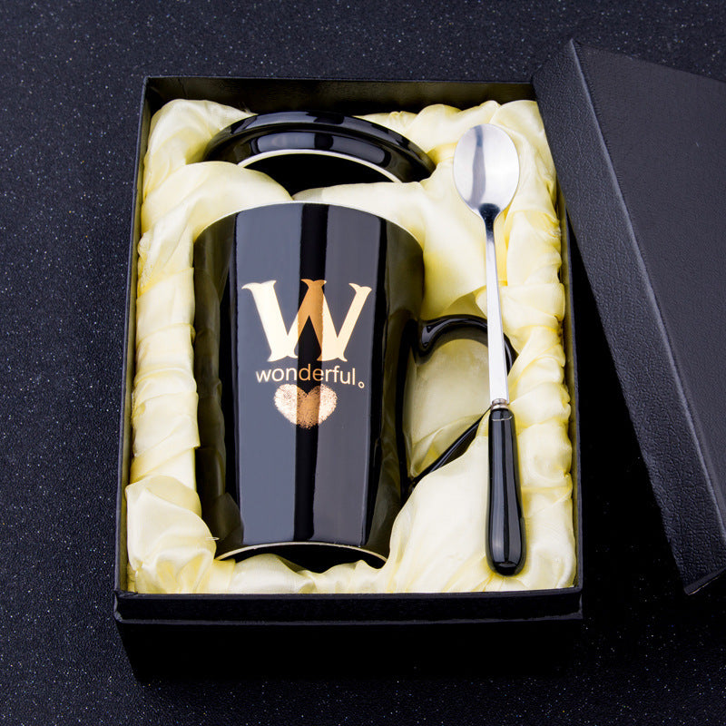 Elegant Black and Gold Ceramic Mug with Lid and Spoon