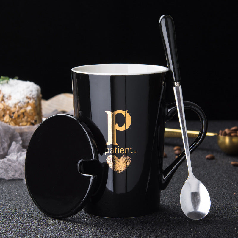 Elegant Black and Gold Ceramic Mug with Lid and Spoon
