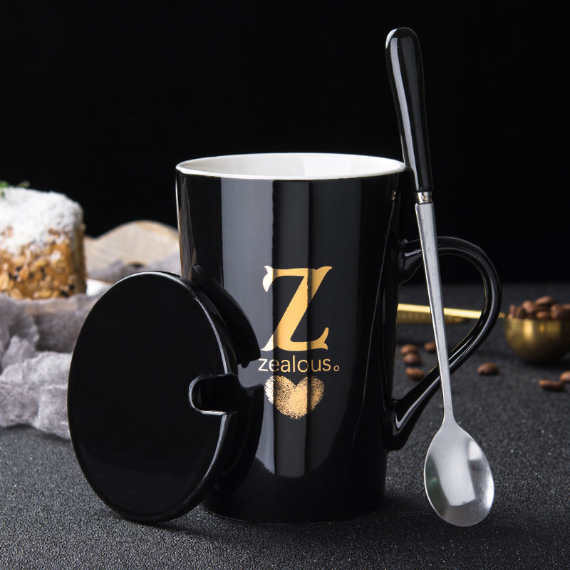 Elegant Black and Gold Ceramic Mug with Lid and Spoon