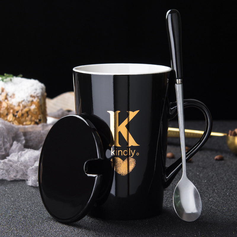 Elegant Black and Gold Ceramic Mug with Lid and Spoon