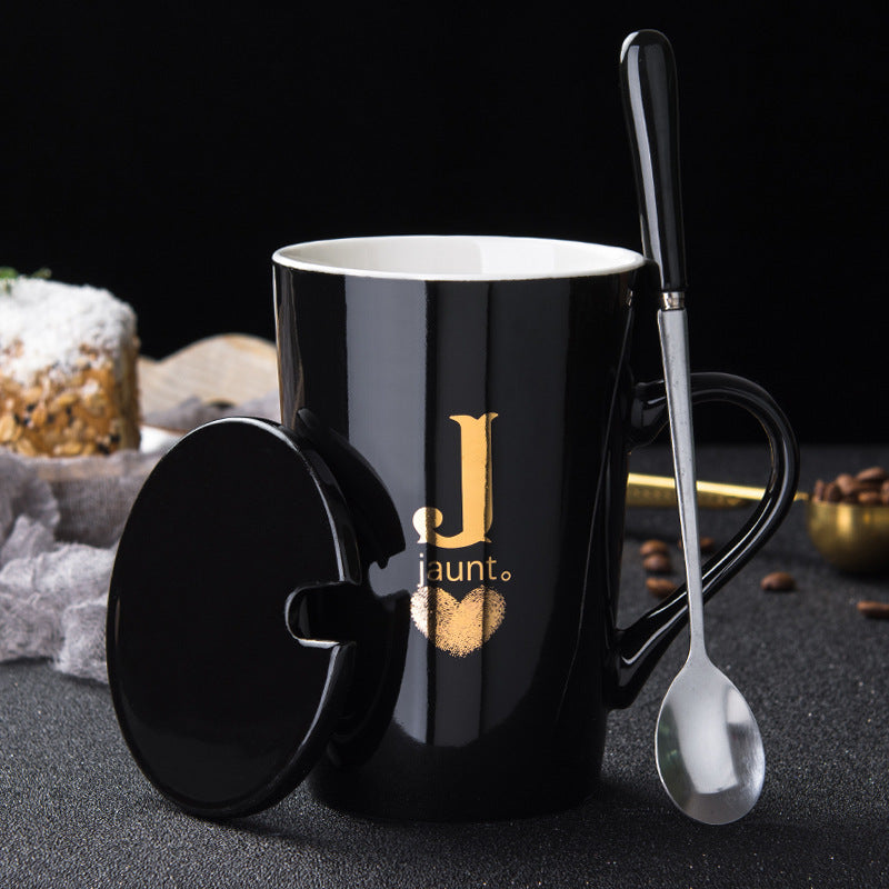 Elegant Black and Gold Ceramic Mug with Lid and Spoon