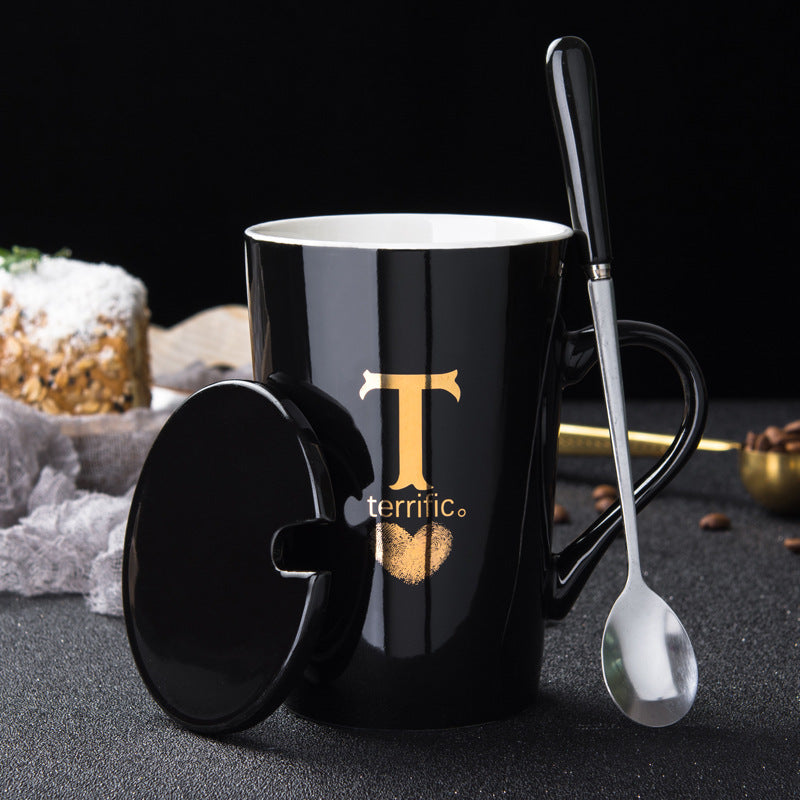 Elegant Black and Gold Ceramic Mug with Lid and Spoon