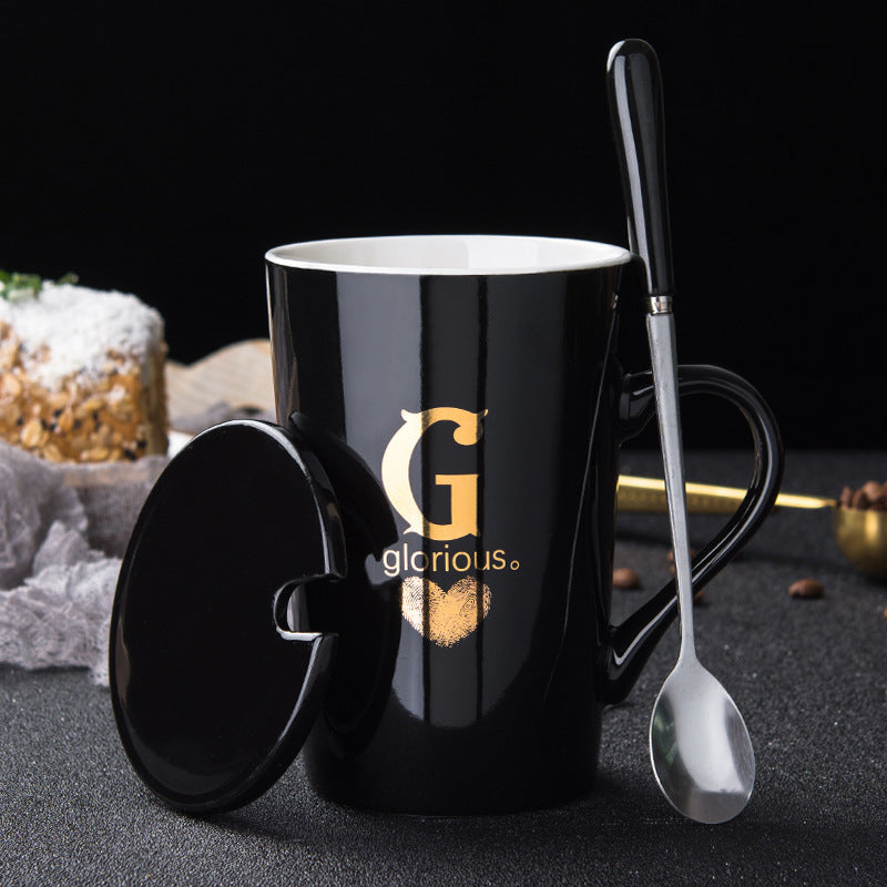 Elegant Black and Gold Ceramic Mug with Lid and Spoon