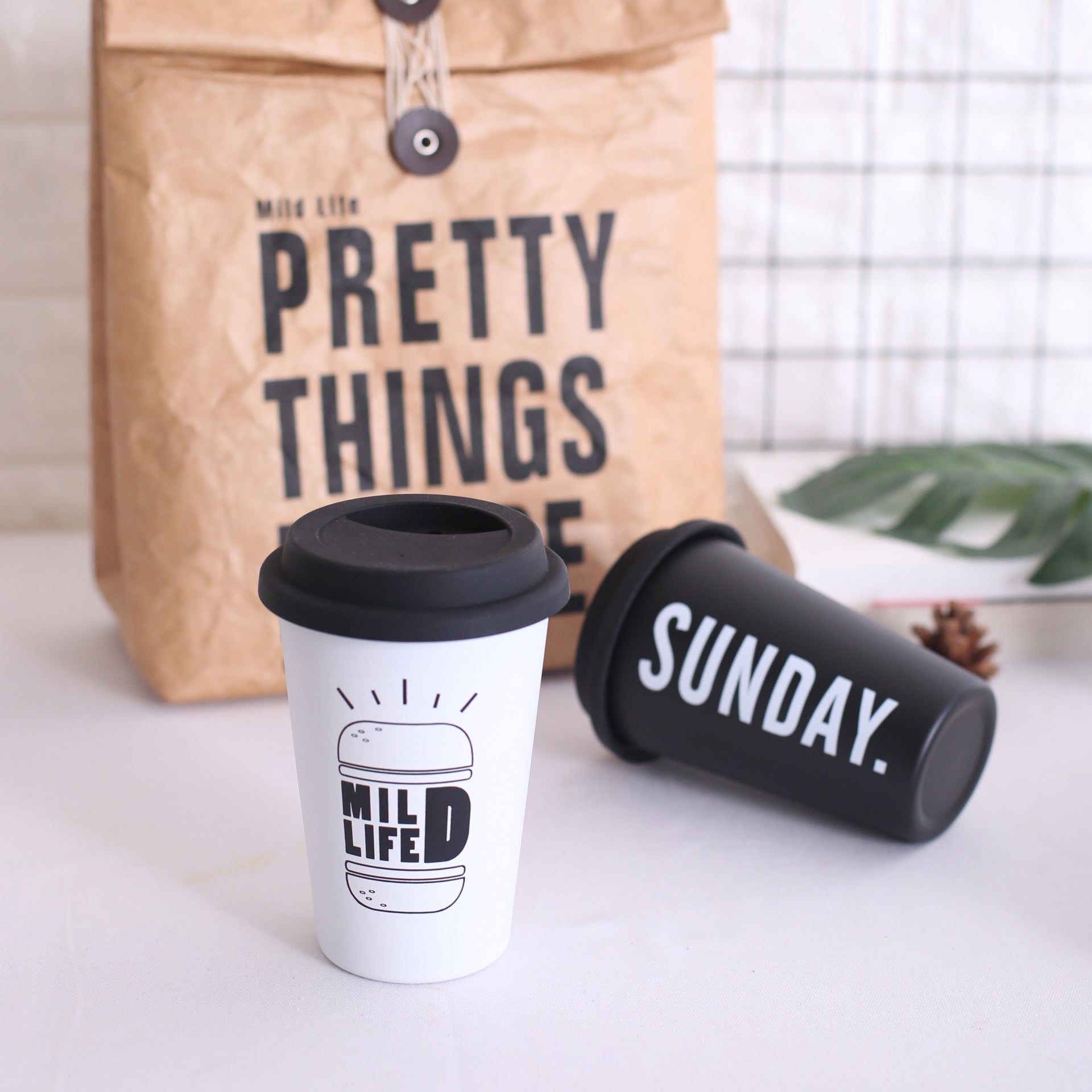 Stylish Reusable Coffee Cups with Lids