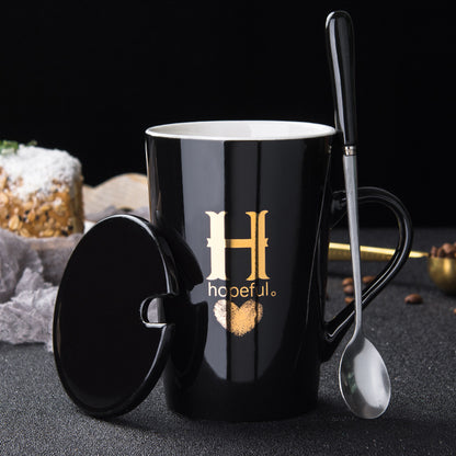 Elegant Black and Gold Ceramic Mug with Lid and Spoon