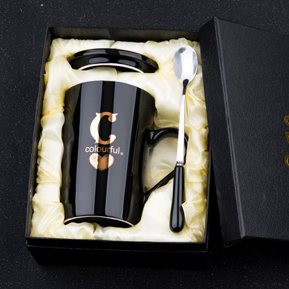 Elegant Black and Gold Ceramic Mug with Lid and Spoon