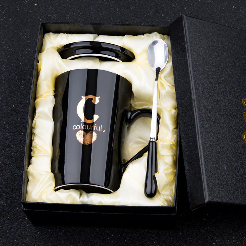 Elegant Black and Gold Ceramic Mug with Lid and Spoon