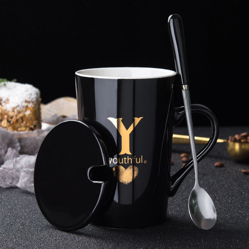 Elegant Black and Gold Ceramic Mug with Lid and Spoon