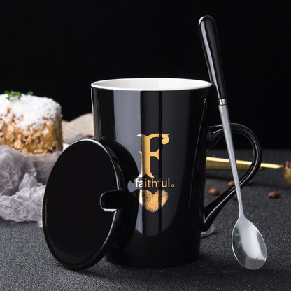 Elegant Black and Gold Ceramic Mug with Lid and Spoon