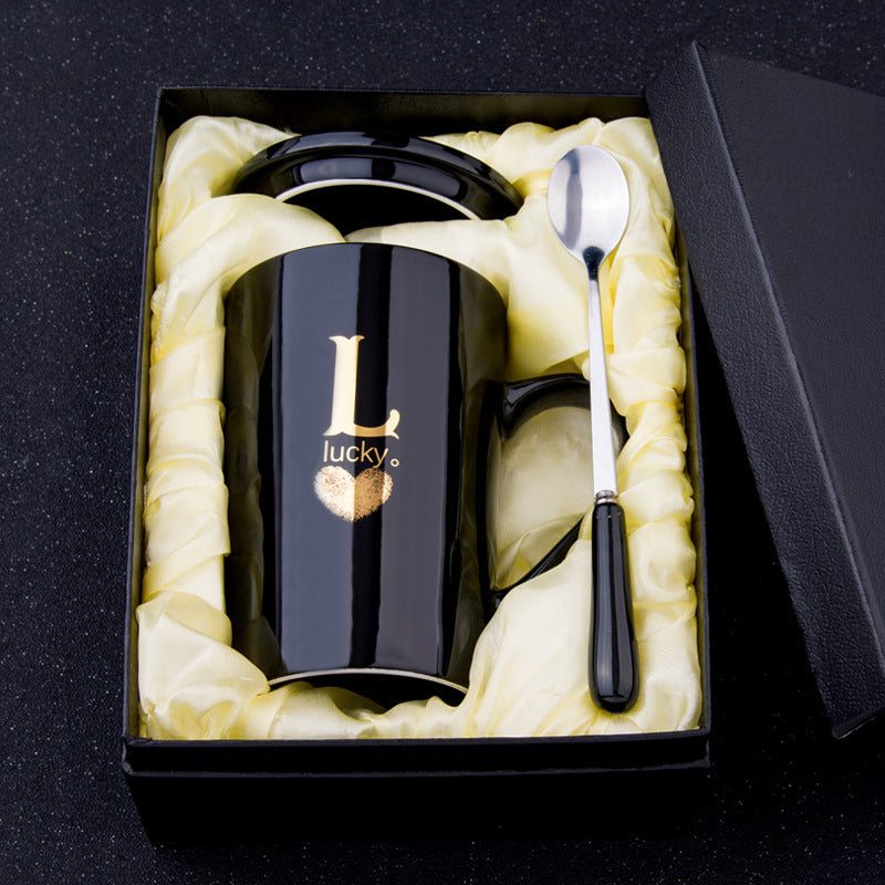Elegant Black and Gold Ceramic Mug with Lid and Spoon
