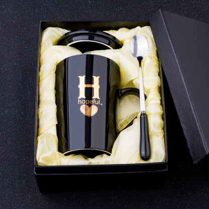 Elegant Black and Gold Ceramic Mug with Lid and Spoon